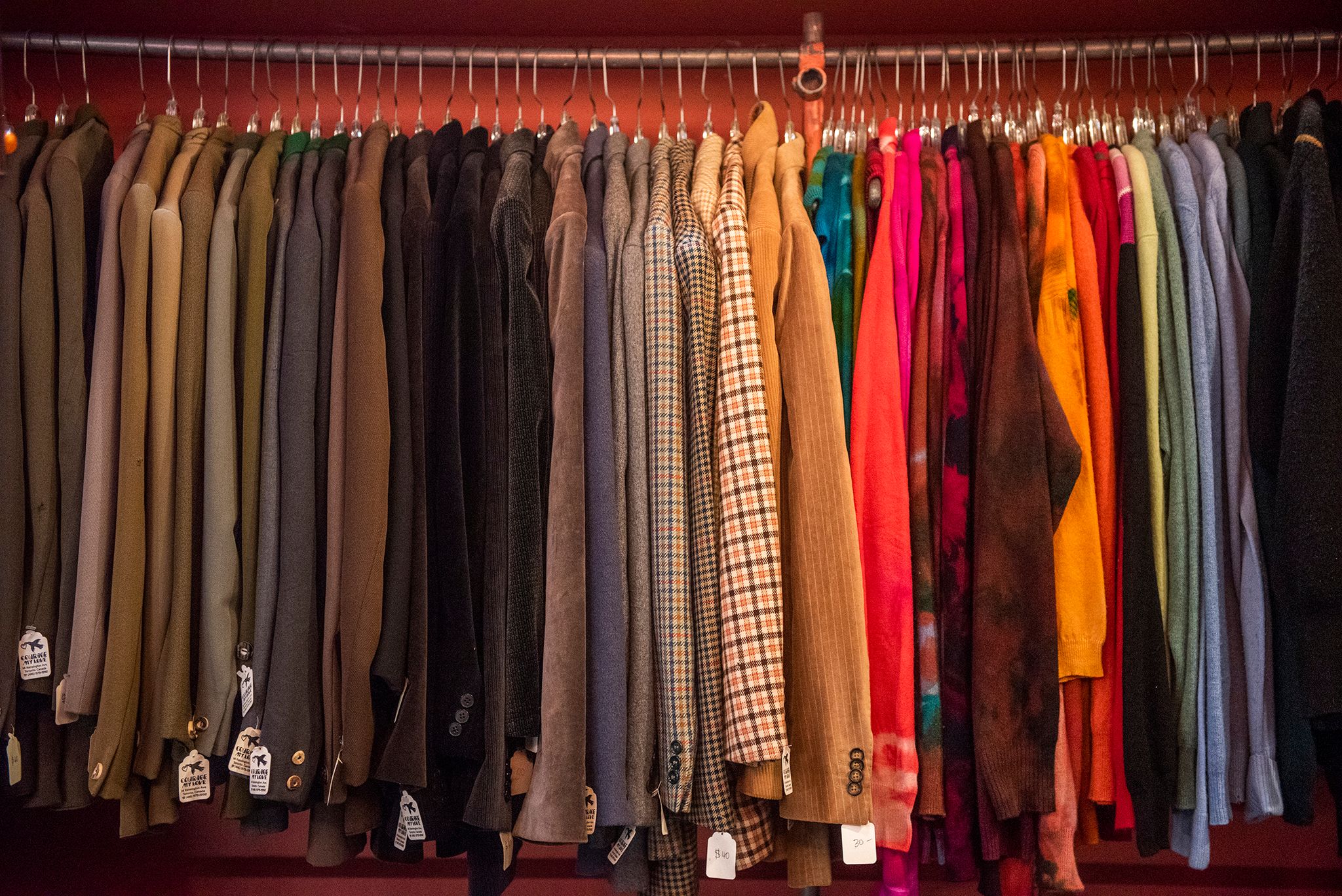 Hand-painted signs and shop history.