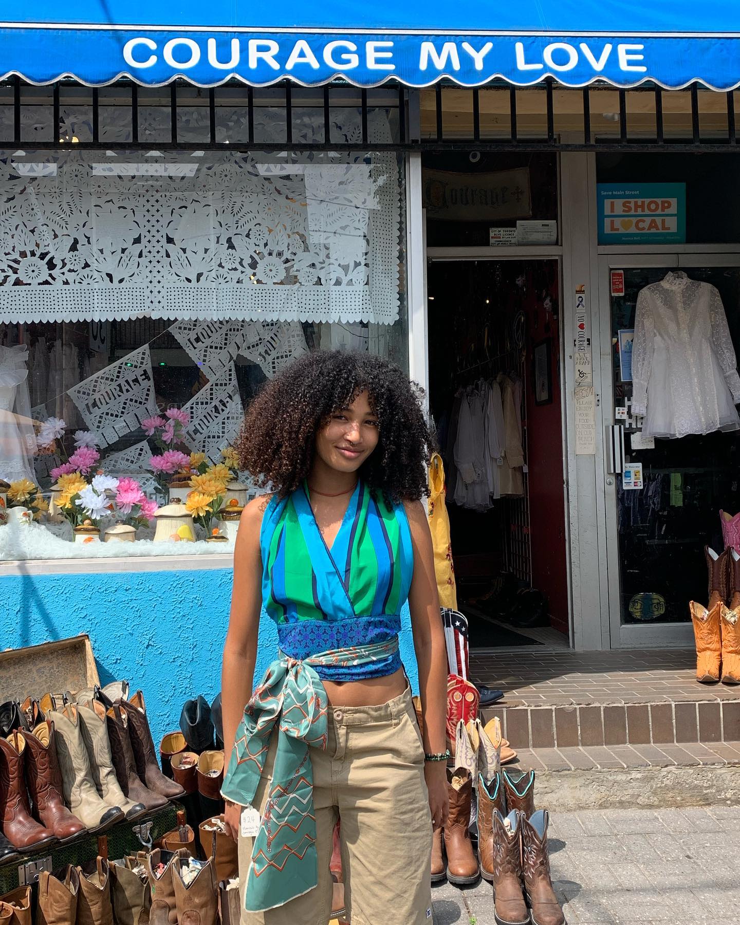 Vintage cowboy boots and leather goods.